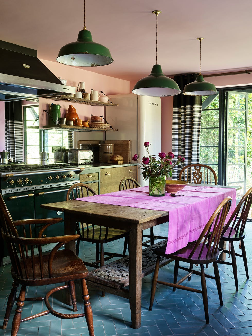 Cozy kitchen setting with a dining table and vibrant decor.