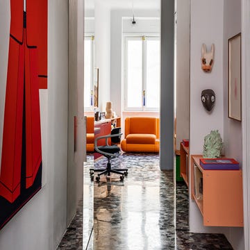 Modern hallway leading to a vibrant living area