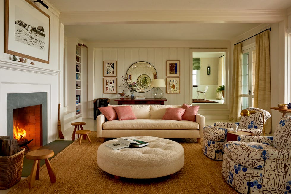 Cozy living room featuring a fireplace and stylish furniture. Cozy living room featuring a fireplace and stylish furniture.