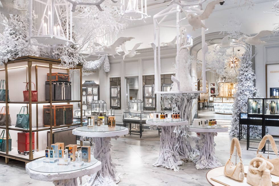 a luxury store with pedestal made of wintery branches.