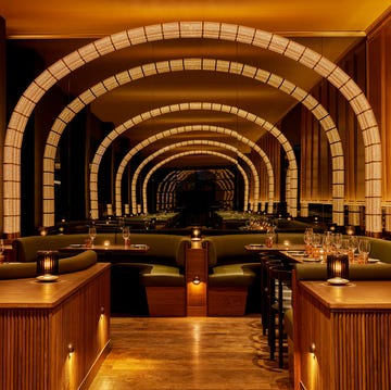 a room with a large arched ceiling