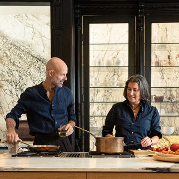 Guzmán and Mitchell in kitchen Guzmán and Mitchell in kitchen