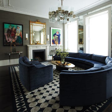 modern living room with circular seating and artwork