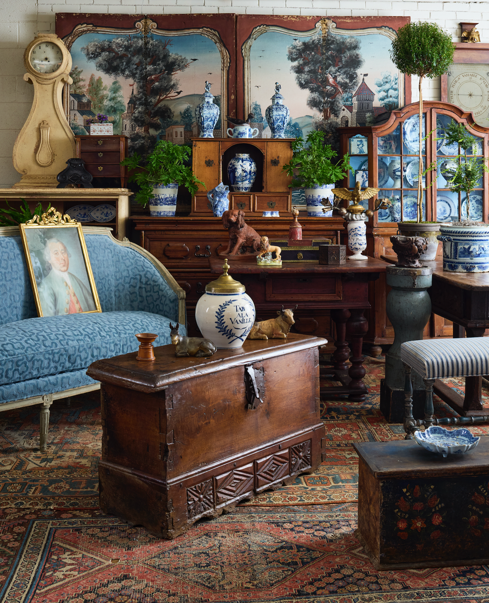 Antique-filled interior featuring furniture, decor, and various artifacts.